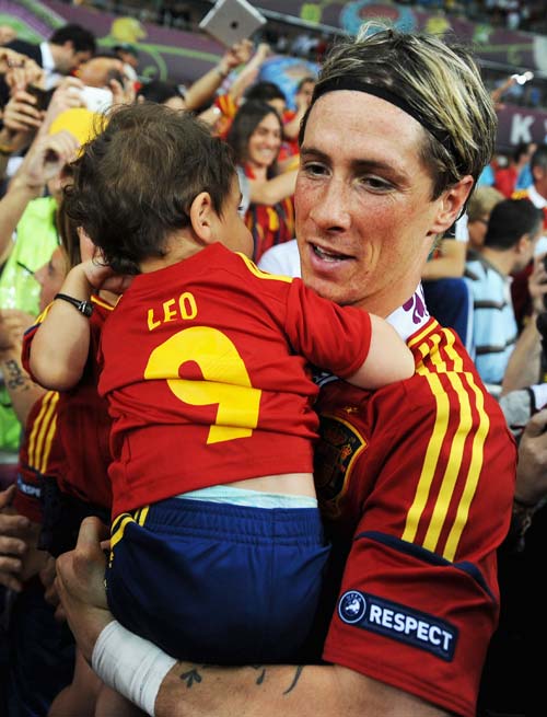 Fernando Torres con su hijo